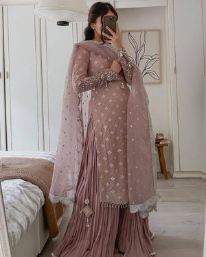 "Front view of the Pale Pink Embroidered Chikankari Kurta Set showcasing the intricate mirror and sequins embroidery on the top, paired with the matching Fox Georgette palazzo and organza silk dupatta."
