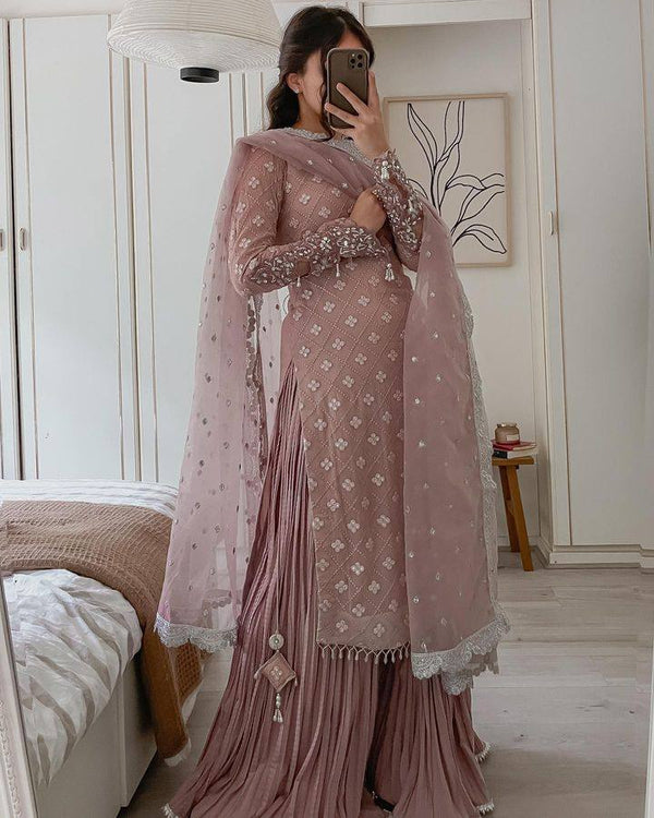 "Front view of the Pale Pink Embroidered Chikankari Kurta Set showcasing the intricate mirror and sequins embroidery on the top, paired with the matching Fox Georgette palazzo and organza silk dupatta."