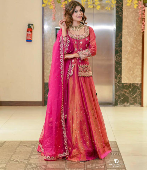 "Full view of pink embroidered lehenga set with sequins and moti work, featuring a flared lehenga, stitched top, and orgenza dupatta – perfect for weddings"