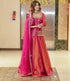 "Full view of pink embroidered lehenga set with sequins and moti work, featuring a flared lehenga, stitched top, and orgenza dupatta – perfect for weddings"