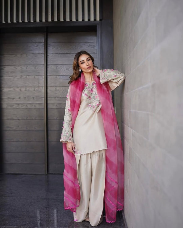 Model wearing designer Farshi Salwar Suit with heavy embroidery and dupatta