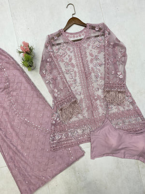 Detailed view of the micro-fabric blouse included in the Capri set