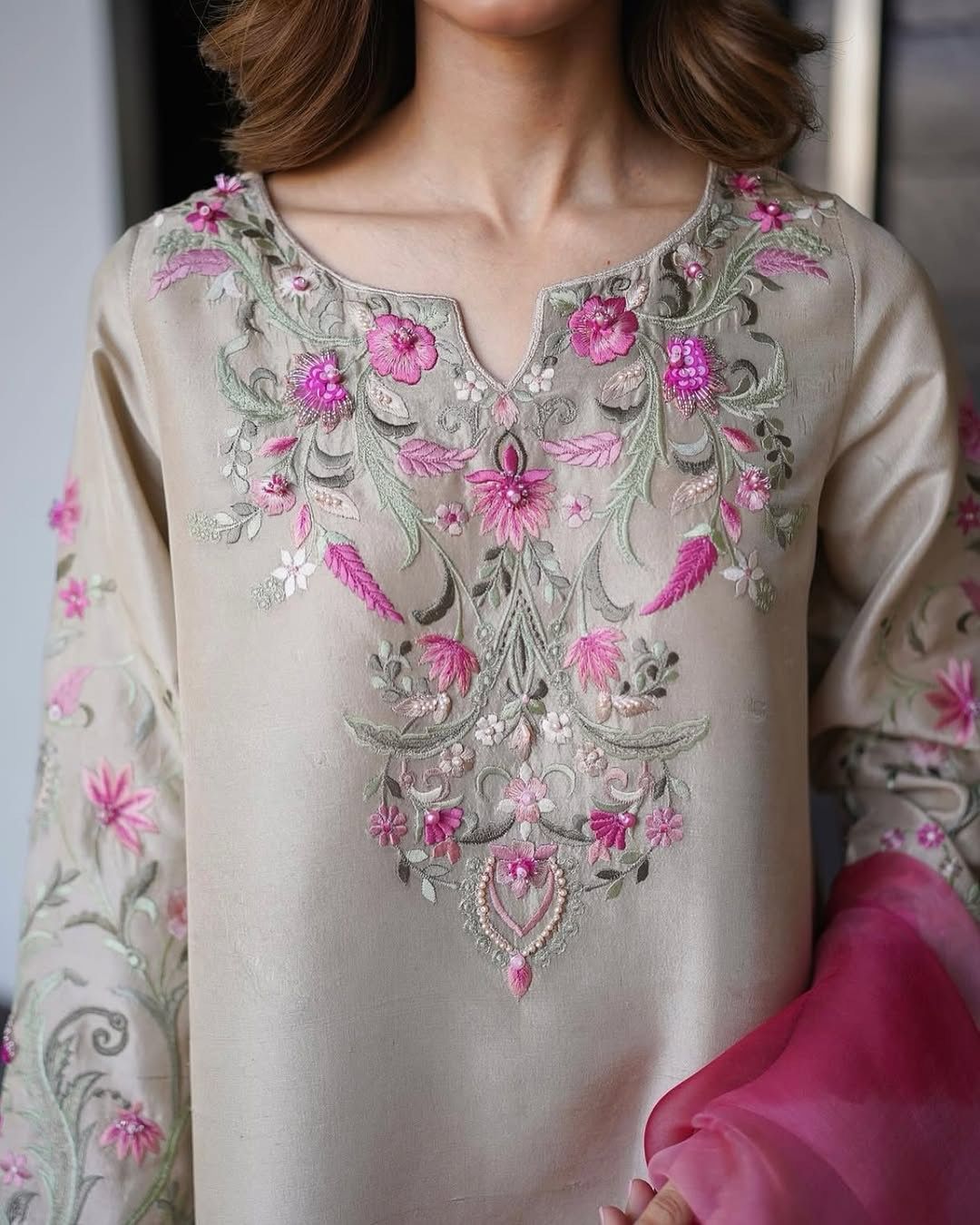 Close-up of embroidery work on Farshi Salwar Suit fabric