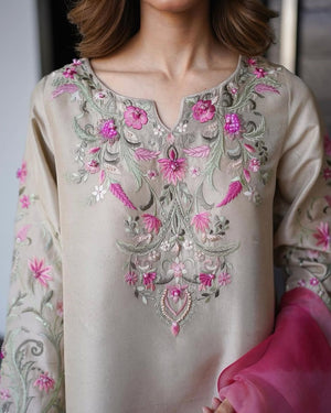 Close-up of embroidery work on Farshi Salwar Suit fabric